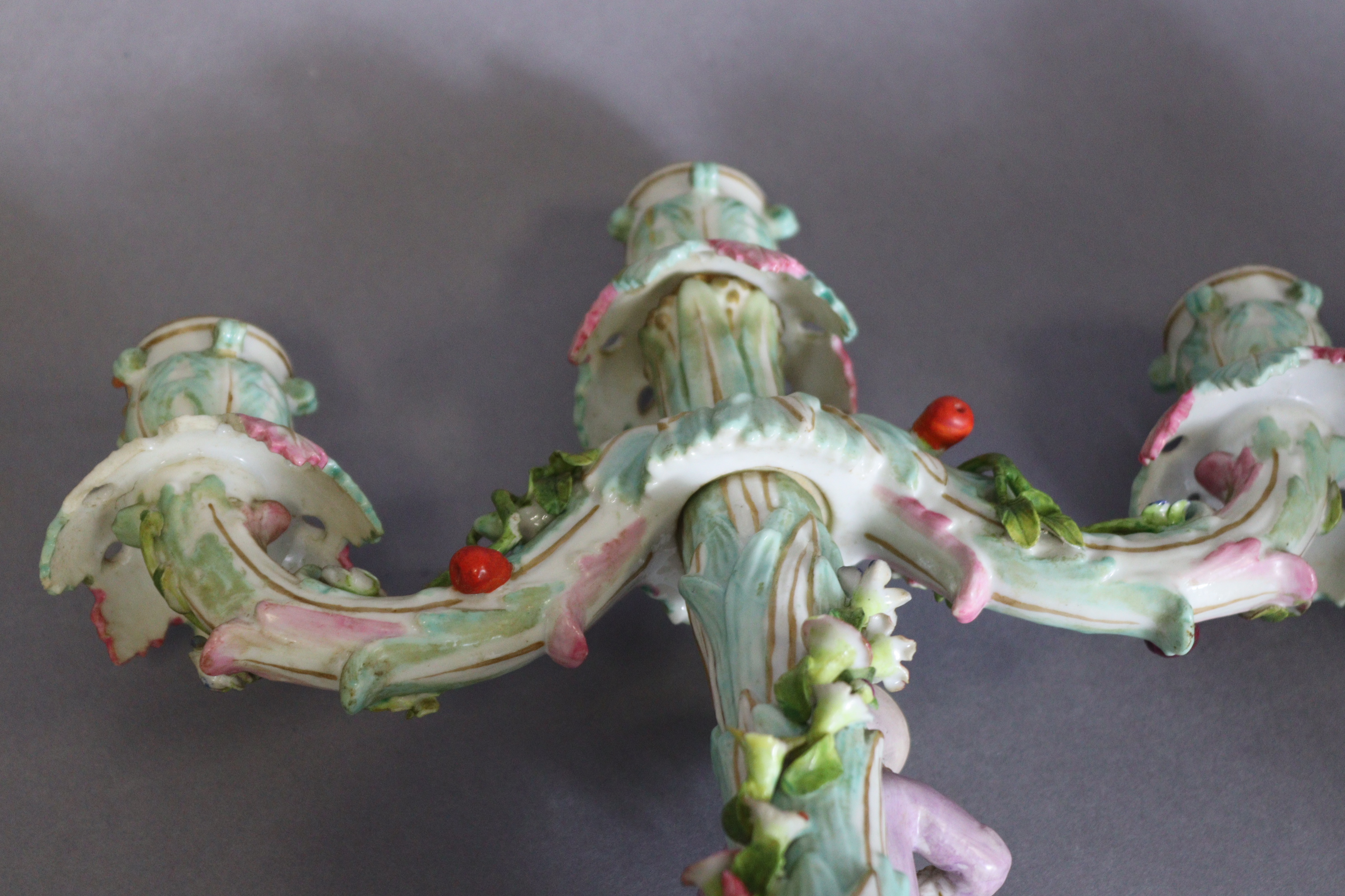 A pair of Meissen porcelain three-branch floral-encrusted candelabra, one with a girl holding a - Image 10 of 11