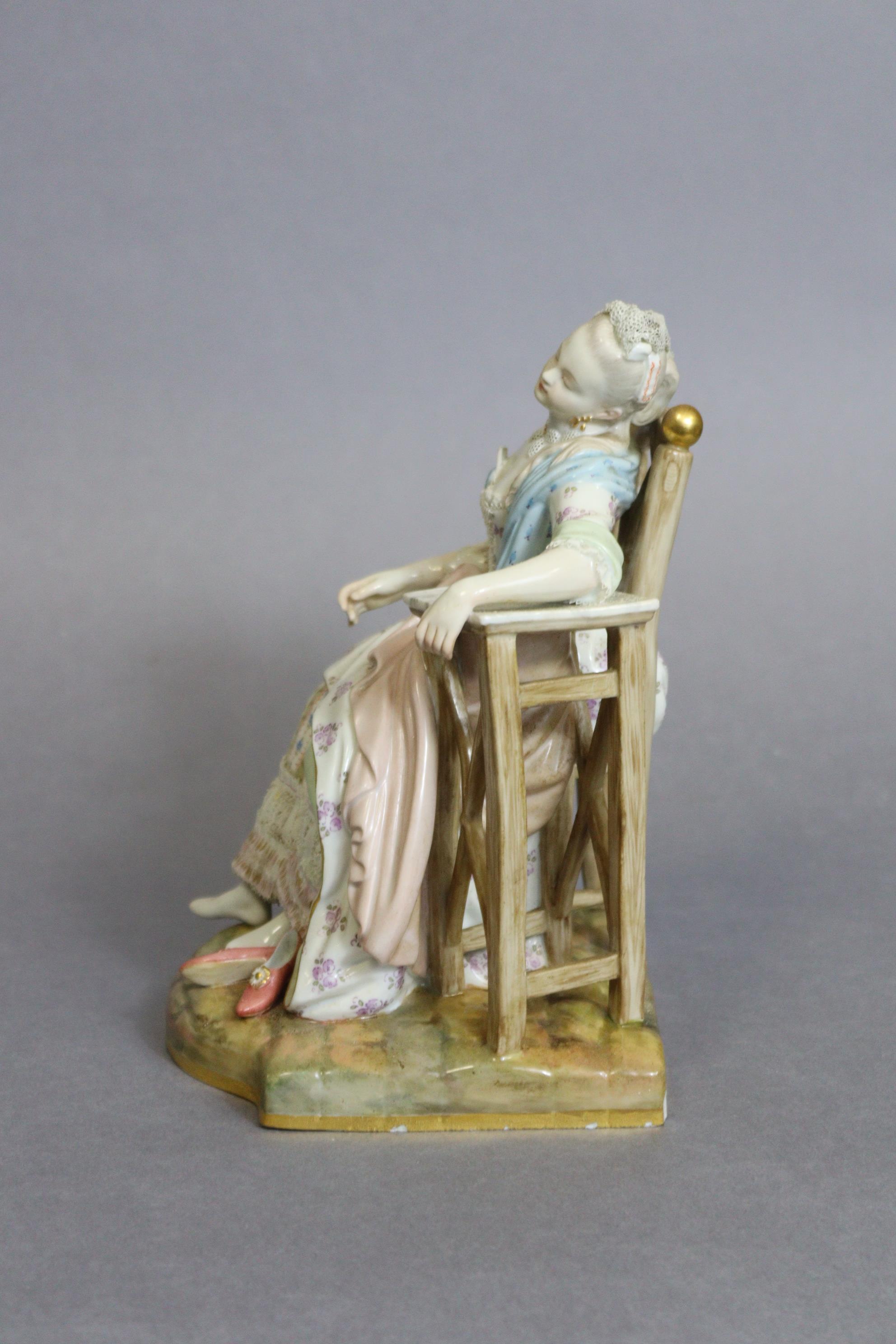 A Meissen figure of a lady asleep in a chair, one arm resting on a marble-top table, blue crossed - Image 3 of 5
