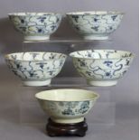Four early 19th century Chinese porcelain Tek Sing Cargo ‘Lotus’ bowls, 6¼” dia.; & another