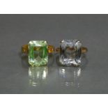 A Chinese 22K ring set rectangular-cut pale green stone, size P, weight 6.3g; & a 9K ring set