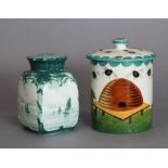 A Wemyss pottery cylindrical honey pot painted with bees & a skep in a landscape, 4.75” high x 3.25”