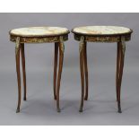 A pair of 19th century French mahogany oval occasional tables with marble tops & gilt metal