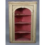 A late 19th/early 20th century pine standing corner cabinet fitted three shaped open shelves, 37”