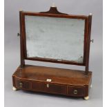 A 19th century inlaid-mahogany rectangular swing toilet mirror fitted with three small drawers to