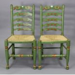 A matching pair of ladder-back dining chairs with woven rush seats, & on turned tapered legs with