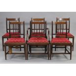 A set of six 19th century mahogany dining chairs with inlaid top-rails, open splat backs & padded