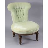 A Victorian nursing chair with shaped buttoned-back & sprung seat upholstered pale green velour, &