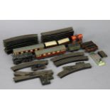 A Trix Twin “OO” gauge scale model of an 0-4-0 LMS locomotive; various items of “OO” gauge rolling