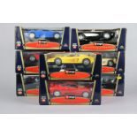 Eight Burago large scale die-cast Special Collection model sports cards, each with window box.