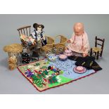 A celluloid baby doll; various items of doll’s house furniture; model cars, etc.