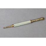 A Perry & Co. yellow-metal & mother-of-pearl cased propelling pencil.