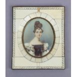 A 19th century French portrait miniature of a young lady wearing a low-cut dress, 3¼” x 2½” (