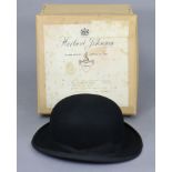 A black felt bowler hat by Christy of London, with hat box.