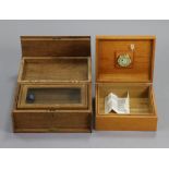 Two wooden agar humidors, 13¼”; & 10¼” wide.