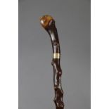 A 1940’s gent’s hawthorn walking cane with a 9ct. gold mount, 36 ¾” high.