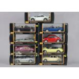 Nine Maisto large scale die-cast model motorcars, each with window box.