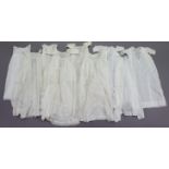 Eighteen various 19th century & later white cotton christening gowns & nightgowns.