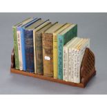 Various children’s books; together with various other volumes & a teak adjustable book trough.