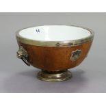 A vintage oak salad bowl with plated mounts, lion-mask ring handles, & on a plated pedestal foot,