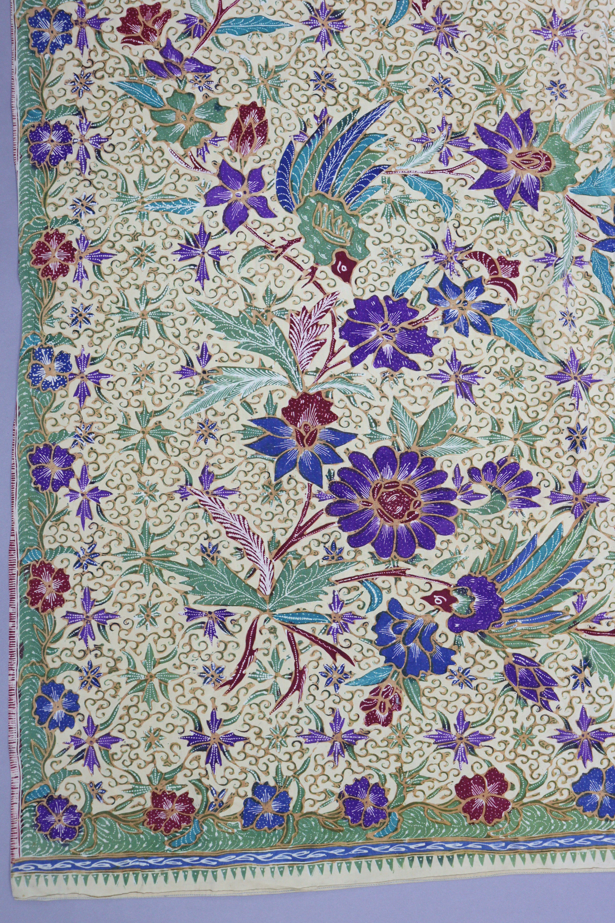 A 1930’s batik, of cream ground with all-over repeating multicoloured geometric & foliate design; - Image 2 of 6