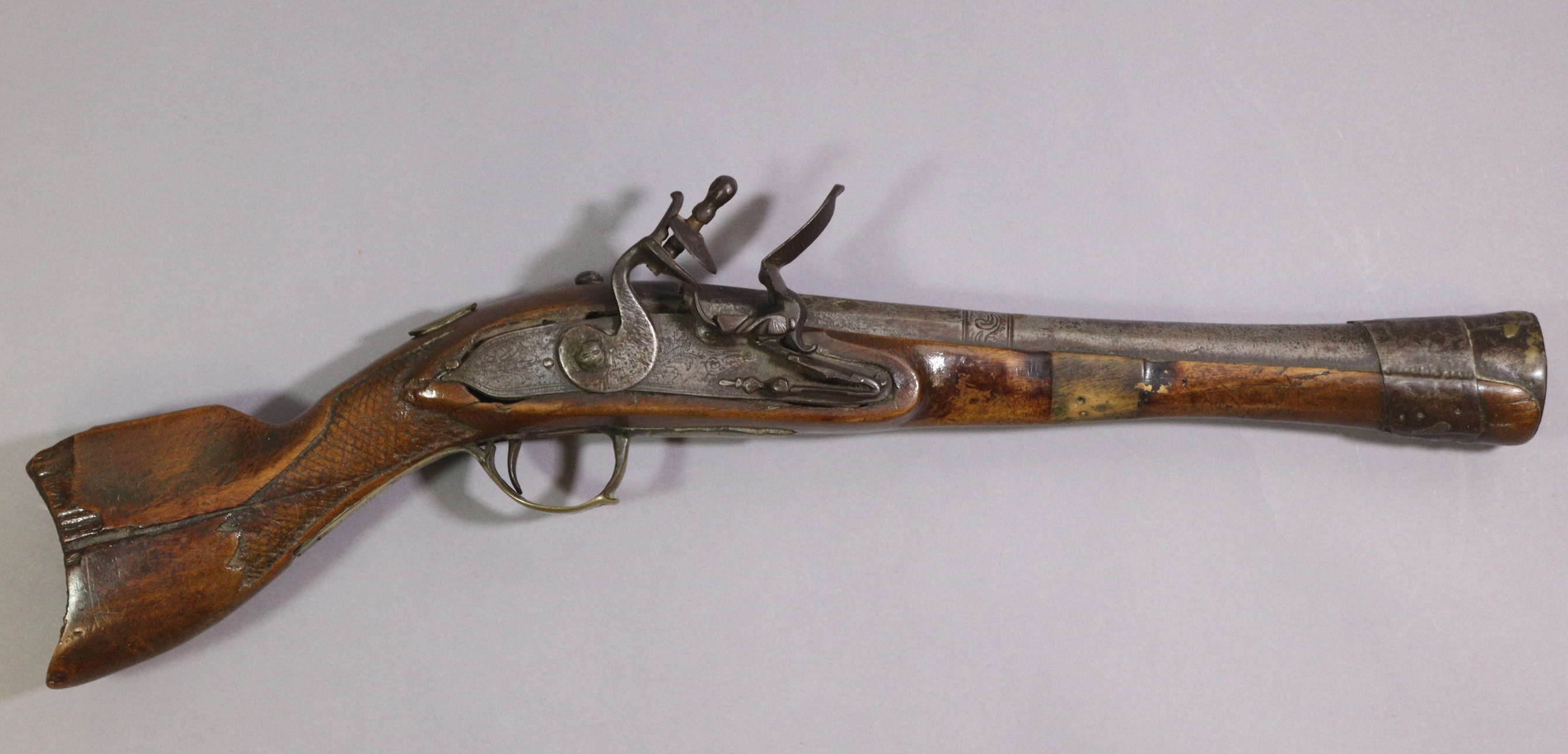 A 19th century Ottoman blunderbuss 'knee' pistol, 19" long.