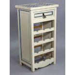 A continental-style white & blue painted wooden kitchen side table inset tiles to the top, &