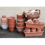 A collection of approximately 60 various terracotta & other flower pots.