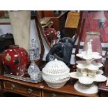 Three cut-glass decanters; a composition nude female sculpture, an art glass vase, etc.