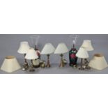 Eight various table lamps, with shades.