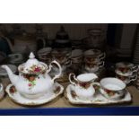 A Royal Albert bone china “Old Country Roses” 21-piece tea service; and various other decorative