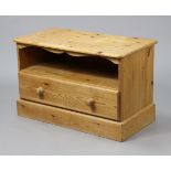 A pine dwarf cabinet with an open recess above a long drawer, & on plinth base, 33¼” wide x 21½”
