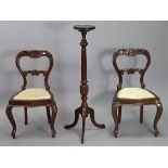 A pair of eastern carved hardwood occasional chairs with padded seat, & on cabriole legs; & a