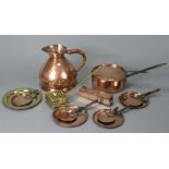 A 19th century copper saucepan with iron side handle, 10¾” dia.; a 19th century copper jug