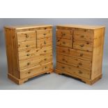 A pair of pine chests each fitted with an arrangement of four short & three long drawers with