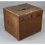 A vintage canvas-covered & leather-bound travelling trunk with a hinged lift-lid revealing fitted