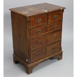 A small mahogany chest fitted two short & three long graduated drawers, & on bracket feet, 23¼” wide
