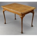 A 1930’s oak centre table with moulded edge & rounded corners to the rectangular top, & on slender