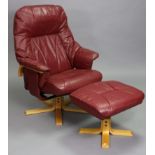 A Unico (Danish) crimson leatherette swivel easy chair; & a ditto rectangular footstool.