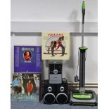 A G-Tech AirRam upright vacuum cleaner, a Philips micro system, & various LP records.