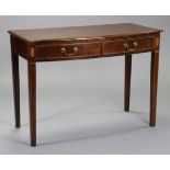 An early 19th century inlaid-mahogany low side table with rounded front corners, fitted frieze