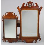 A Georgian rectangular wall mirror in fret-carved mahogany frame with gilt inner slip & pierced