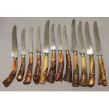 A set of six late 19th century Japanese table knives with steel blades & bone handles carved with