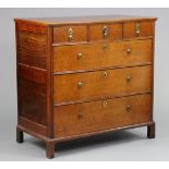 An 18th century oak chest with moulded edge to the rectangular top & fielded panel sides, fitted