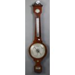 A 19th century banjo barometer with 7½” silvered dial, thermometer, & hygrometer signed “M.