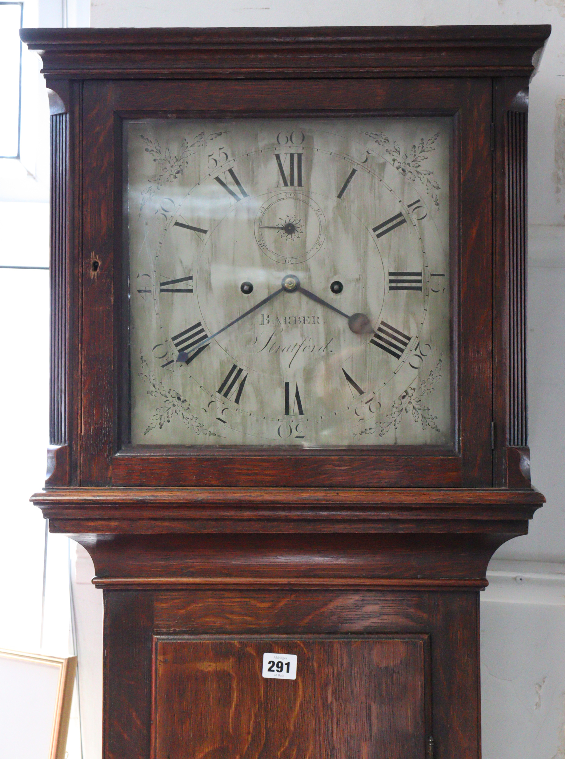 A late 18th century longcase clock with 12” engraved silvered dial signed “BARBER, Stratford”, 8-day
