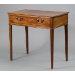 A George III mahogany side table with rectangular overhang top above a frieze drawer, on square