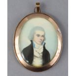 An early 19th century portrait miniature of a gentleman wearing dark jacket, white waistcoat &