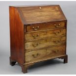 A George III figured mahogany bureau, fitted four long graduated drawers with brass swan-neck