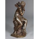 A 19th CENTURY BRONZE MODEL OF A SEATED NYMPH, after Mathurin Moreau, 8” wide x 18¾” high. (left han