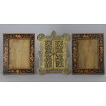 A pair of marquetry decorated small rectangular photograph frames on easel supports, 8” x 6¼” (